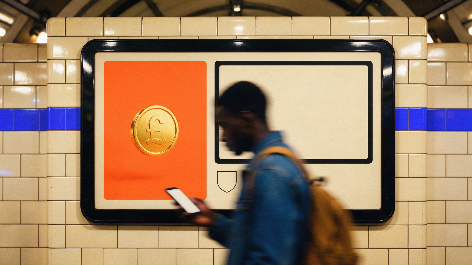 A commuter blurs past an orange savings ad on a glossy London station wall, its boxed risk warning sitting on the face of the poster beside a pound coin.