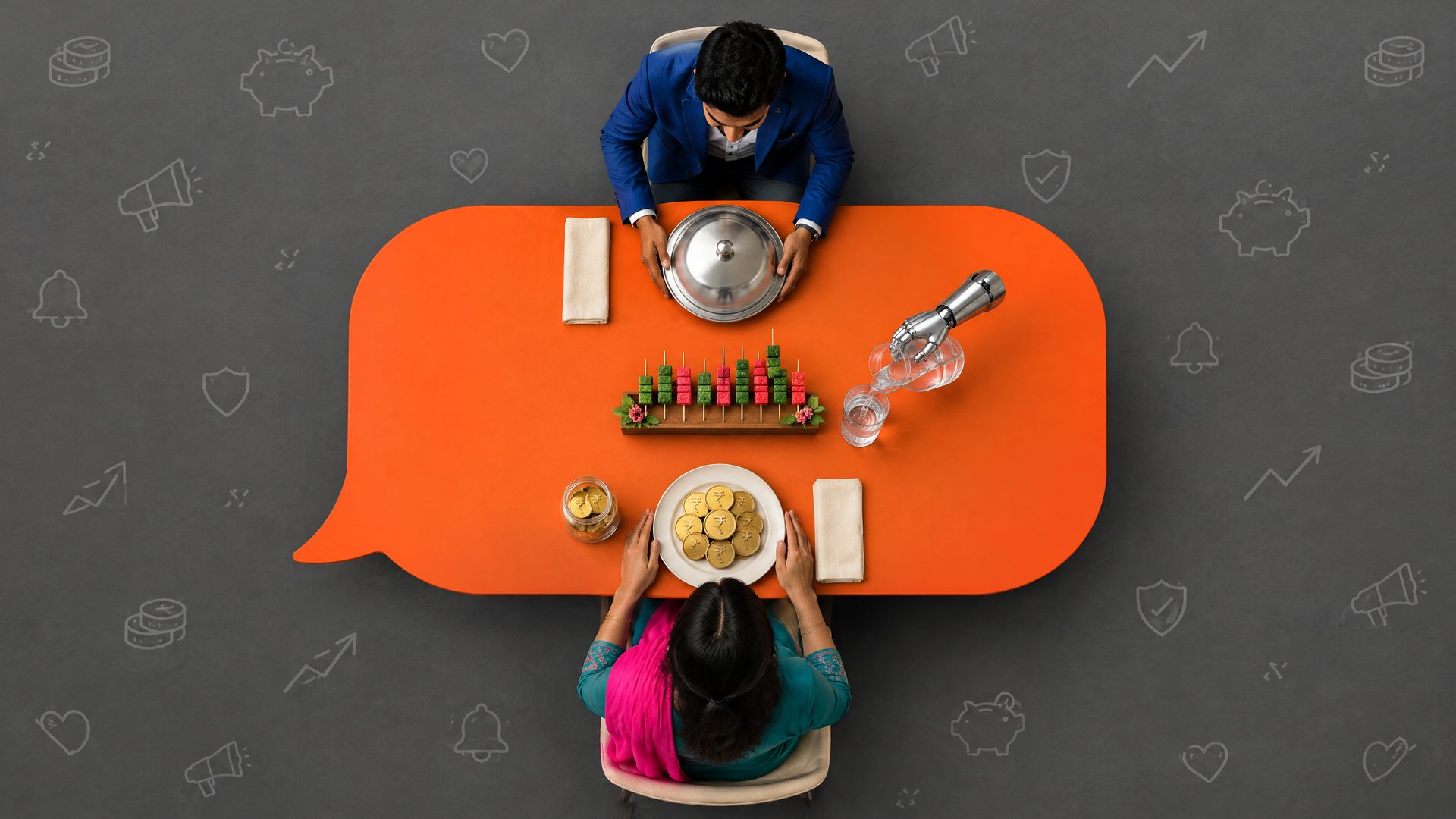 Aerial view of an orange chat-bubble dining table where a young Indian investor sits at the head with gold coins while a distributor serves a dish down to her.