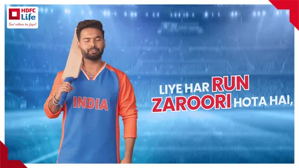 Display ad for HDFC Life: a cricketer in an India jersey with a bat, Hindi lines about every run mattering